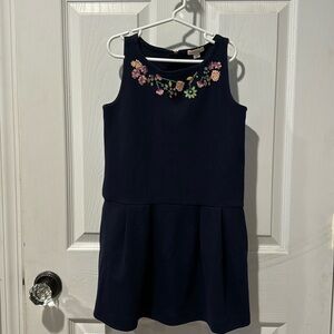 Girls crewcut EUC dress embroidered with some beading on the top.